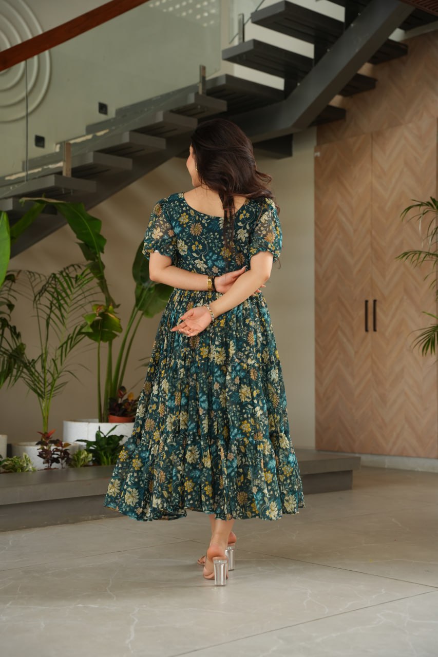 Vikarni Green Printed Anarkali Gown in faux georgette with 12-meter flair – perfect ethnic wear for women, long gown for women, printed gown for girls, Anarkali gown for wedding, georgette gown for festive wear, Indian dress for women, traditional wear for haldi ceremony, party wear gown online, readymade gown under 1000, stylish green ethnic gown for mehndi function.